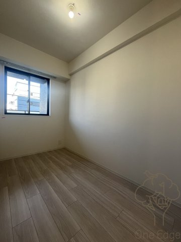 コンフォリア新大阪宮原Qの寝室