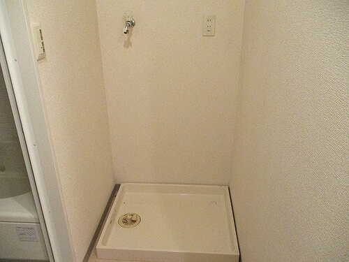 サーパスシティ新屋敷一番館のその他|室内洗濯機置場