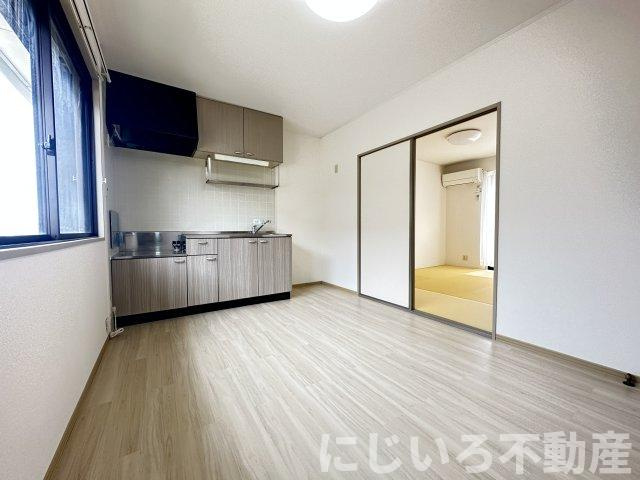 エスパシオ那賀川Bの居間・リビング