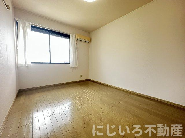 エスパシオ那賀川Bの居間・リビング
