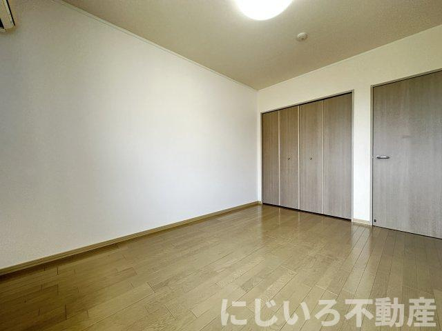 エスパシオ那賀川Bの居間・リビング