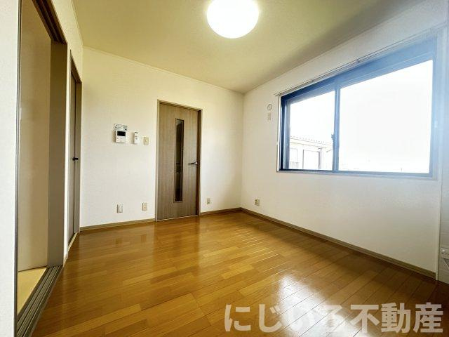 エスパシオ那賀川Bの居間・リビング