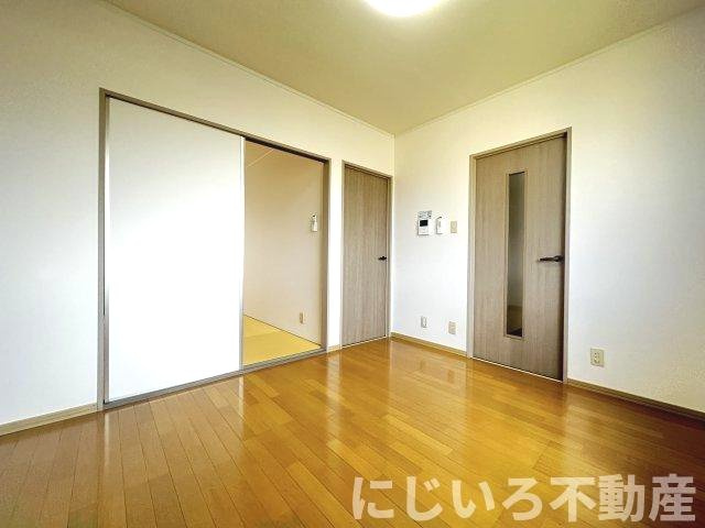 エスパシオ那賀川Bの居間・リビング