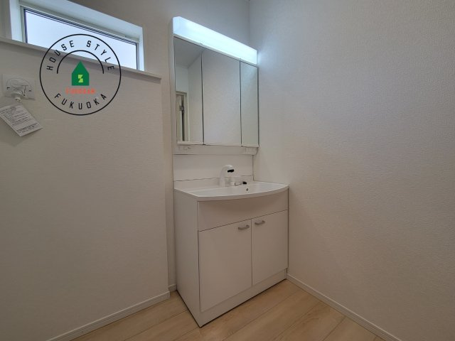 春日市一の谷1丁目第8-4棟（2号棟）の内観：施工例|洗面所は小さなプライベートスペース。歯磨き、洗顔と毎日施す個人空間。