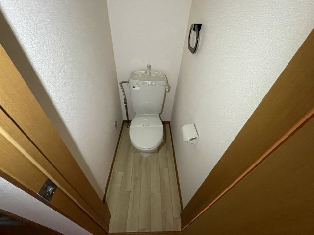 コーポウインズAの駐車場