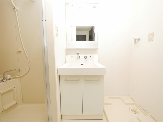 大阪市淀川区十三本町２丁目の賃貸マンションの洗面所