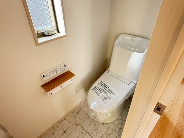 岩槻区加倉　新築一戸建て　1号棟のトイレ|落ち着いた色調のトイレです