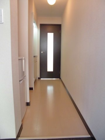 レオネクストＦｒｅｅ　Ｏｎｅの玄関