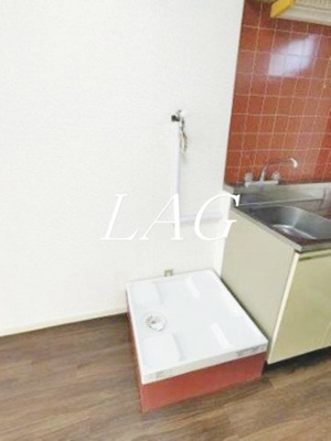 【設備】 | タウンハウスツクモ | 室内洗濯機置場です。