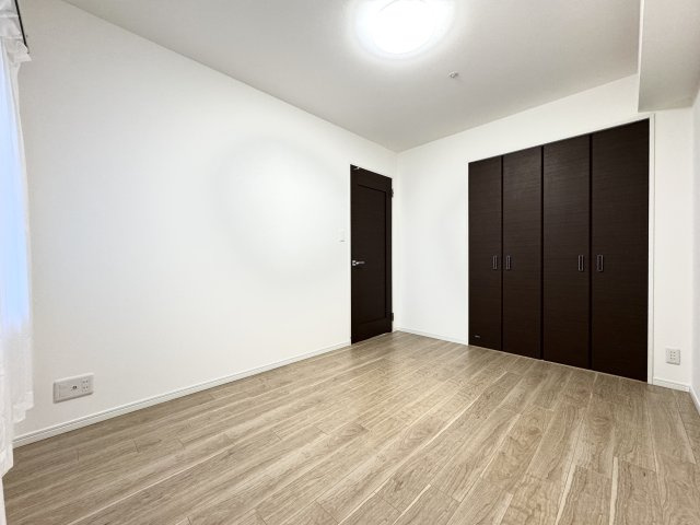 アルファタワー桜町の洋室