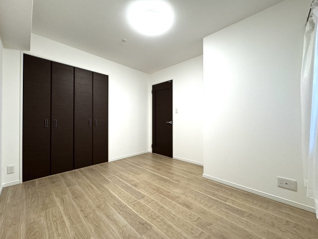 アルファタワー桜町の洋室