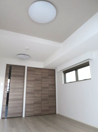 Ｓ ＣＯＭＦＯＲＴ錦糸町の居間・リビング