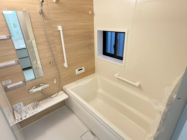 川口市芝宮根町　新築一戸建て　F号棟の浴室|落ち着いた空間のお風呂です