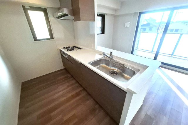 グランクラッセ上野芝向ヶ丘　マンションのキッチン