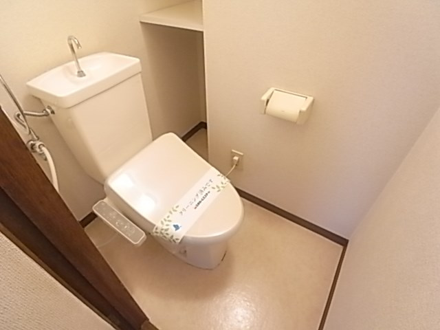 尼崎市塚口町５丁目の賃貸マンションのトイレ