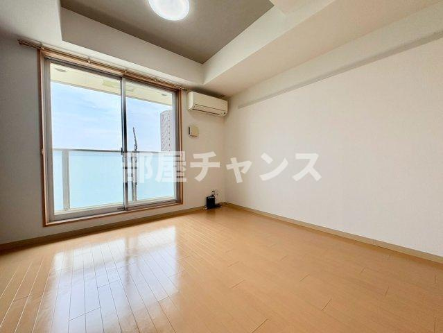 KマンションつるまいⅡの居間・リビング