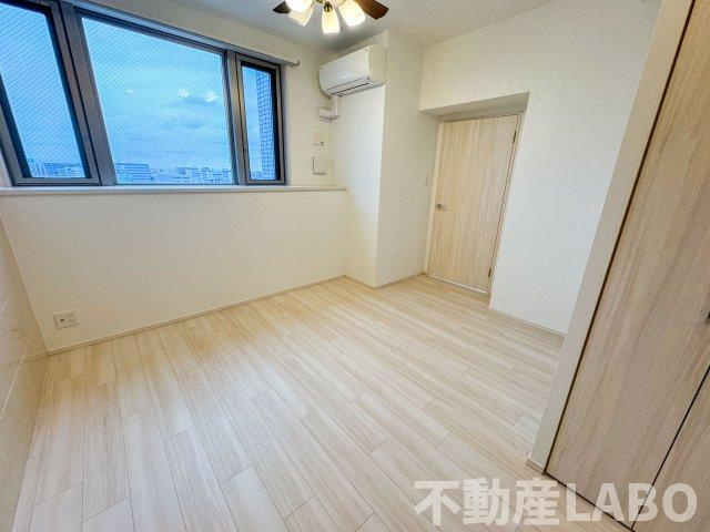 プレジオ難波ASIANの寝室