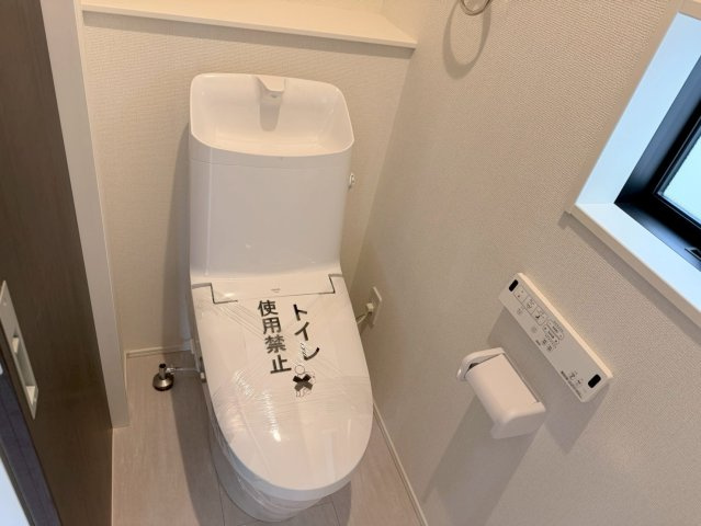 川口市本前川3期　新築一戸建て　4号棟のトイレ|落ち着いた色調のトイレです