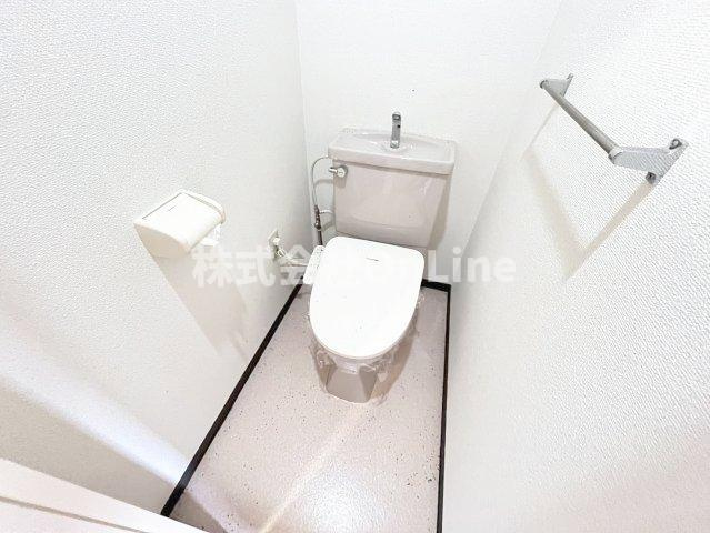 八尾市本町５丁目の賃貸マンションのトイレ
