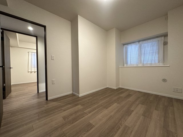 ディアエスタミオ舞子の洋室