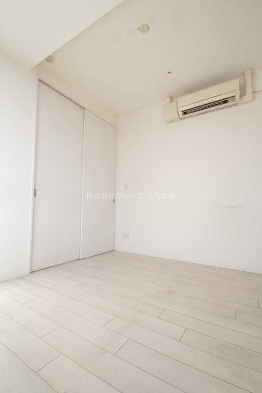 メトロタワー山下町の洋室