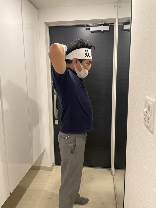 社長と撮影(気合いのハチマキ)の画像