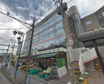 トップパルケ久地店