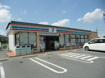セブンイレブン川本田中店