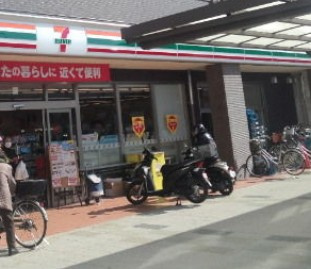 セブンイレブン 飯山満駅前店の画像1