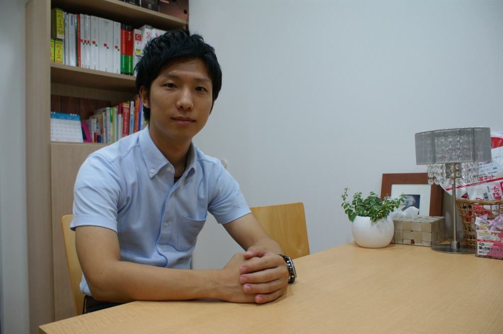 佐野 雄一